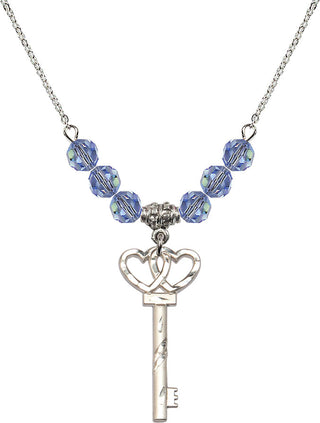18" Rhodium Plated Necklace with 4mm Light Sapphire Crystal Beads featuring a Sterling Silver Small Key w/Double Hearts Medal.
