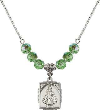18" Rhodium Plated Necklace with 4mm Peridot Crystal Beads featuring a Sterling Silver Infant of Prague Medal. Engraved Catholic Saint Jewelry