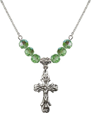 18" Rhodium Plated Necklace with 4mm Peridot Crystal Beads featuring a Sterling Silver Crucifix Medal.