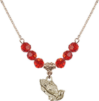 18" Hamilton Gold Plated Necklace with 4mm Ruby Crystal Beads featuring a 14kt Gold Filled Praying Hands Medal.
