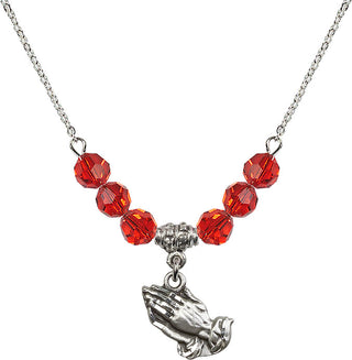 18" Rhodium Plated Necklace with 4mm Ruby Crystal Beads featuring a Sterling Silver Praying Hands Medal.
