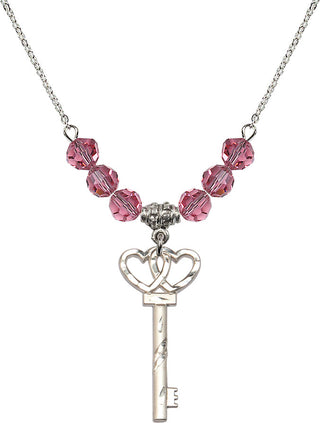18" Rhodium Plated Necklace with 4mm Rose Crystal Beads featuring a Sterling Silver Small Key w/Double Hearts Medal.