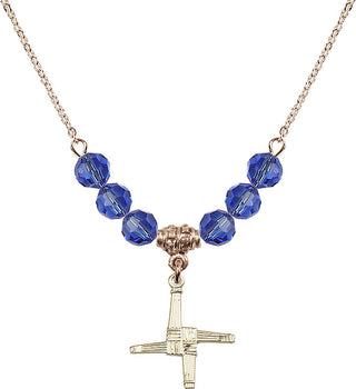 18" Hamilton Gold Plated Necklace with 4mm Sapphire Crystal Beads featuring a 14kt Gold Filled Saint Brigid Cross Medal.