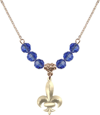 18" Hamilton Gold Plated Necklace with 4mm Sapphire Crystal Beads featuring a 14kt Gold Filled Fleur de Lis Medal.