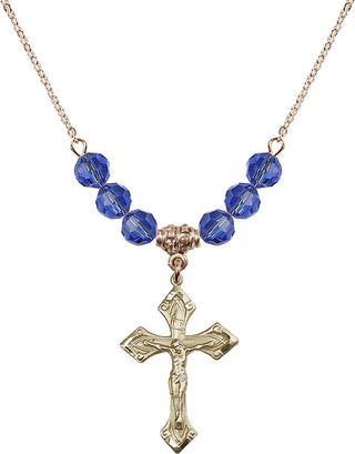 18" Hamilton Gold Plated Necklace with 4mm Sapphire Crystal Beads featuring a 14kt Gold Filled Crucifix Medal.