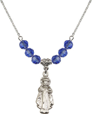 18" Rhodium Plated Necklace with 4mm Sapphire Crystal Beads featuring a Sterling Silver Infant of Prague Medal.