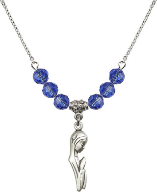 18" Rhodium Plated Necklace with 4mm Sapphire Crystal Beads featuring a Sterling Silver Madonna Medal.
