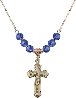 18" Hamilton Gold Plated Necklace with 4mm Sapphire Crystal Beads featuring a 14kt Gold Filled Crucifix Medal.