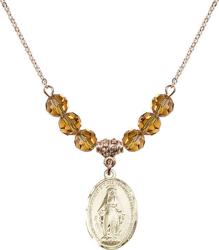 18" Hamilton Gold Plated Necklace with 4mm Topaz Crystal Beads featuring a 14kt Gold Filled Miraculous Medal.