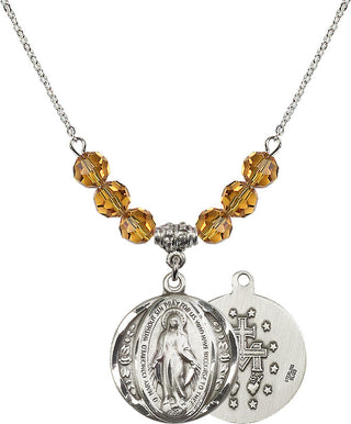 18" Rhodium Plated Necklace with 4mm Topaz Crystal Beads featuring a Sterling Silver Miraculous Medal.