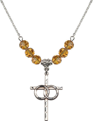 18" Rhodium Plated Necklace with 4mm Topaz Crystal Beads featuring a Sterling Silver Wedding Rings Cross Medal.