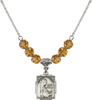 18" Rhodium Plated Necklace with 4mm Topaz Crystal Beads featuring a Sterling Silver Saint Cecilia Medal. Engraved Catholic Saint Jewelry