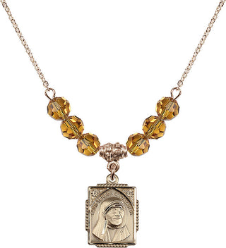 18" Hamilton Gold Plated Necklace with 4mm Topaz Crystal Beads featuring a 14kt Gold Filled Saint Teresa of Calcutta Medal. Engraved Catholic Saint Jewelry