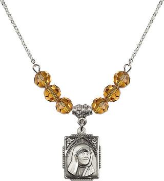 18" Rhodium Plated Necklace with 4mm Topaz Crystal Beads featuring a Sterling Silver Saint Teresa of Calcutta Medal. Engraved Catholic Saint Jewelry