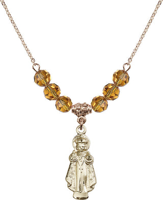 18" Hamilton Gold Plated Necklace with 4mm Topaz Crystal Beads featuring a 14kt Gold Filled Infant of Prague Medal.