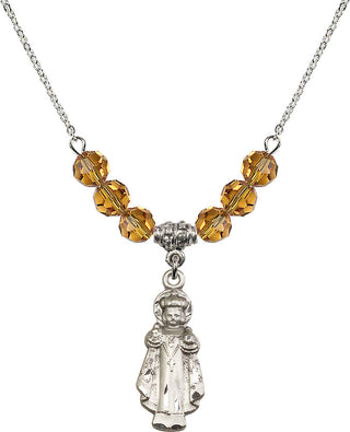 18" Rhodium Plated Necklace with 4mm Topaz Crystal Beads featuring a Sterling Silver Infant of Prague Medal.