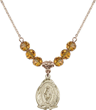 18" Hamilton Gold Plated Necklace with 4mm Topaz Crystal Beads featuring a 14kt Gold Filled Miraculous Medal.