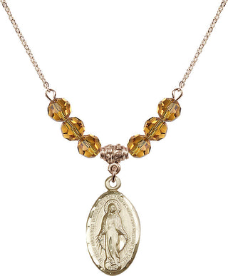 18" Hamilton Gold Plated Necklace with 4mm Topaz Crystal Beads featuring a 14kt Gold Filled Miraculous Medal.