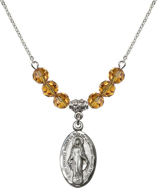 18" Rhodium Plated Necklace with 4mm Topaz Crystal Beads featuring a Sterling Silver Miraculous Medal.