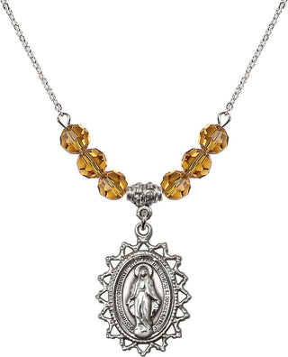 18" Rhodium Plated Necklace with 4mm Topaz Crystal Beads featuring a Sterling Silver Miraculous Medal.