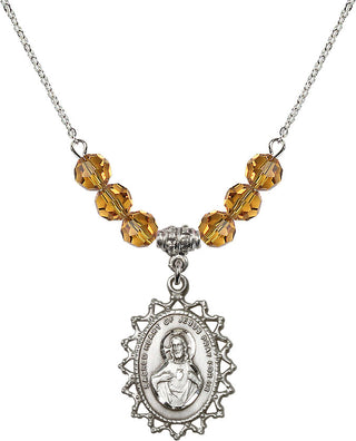 18" Rhodium Plated Necklace with 4mm Topaz Crystal Beads featuring a Sterling Silver Scapular Medal.