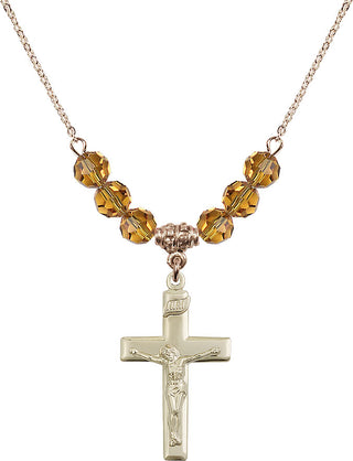18" Hamilton Gold Plated Necklace with 4mm Topaz Crystal Beads featuring a 14kt Gold Filled Crucifix Medal.