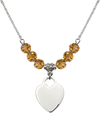18" Rhodium Plated Necklace with 4mm Topaz Crystal Beads featuring a Sterling Silver Heart Medal. Engraved Catholic Saint Jewelry