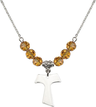 18" Rhodium Plated Necklace with 4mm Topaz Crystal Beads featuring a Sterling Silver Tau Cross Medal.