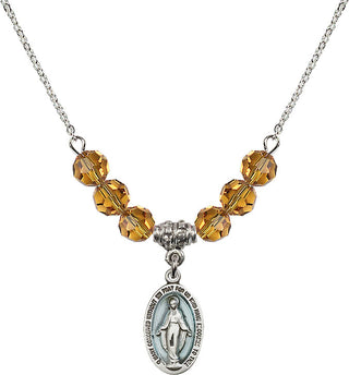 18" Rhodium Plated Necklace with 4mm Topaz Crystal Beads featuring a Sterling Silver Miraculous Medal.