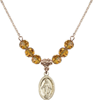 18" Hamilton Gold Plated Necklace with 4mm Topaz Crystal Beads featuring a 14kt Gold Filled Miraculous Medal.