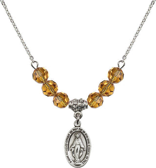 18" Rhodium Plated Necklace with 4mm Topaz Crystal Beads featuring a Sterling Silver Miraculous Medal.