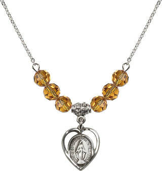 18" Rhodium Plated Necklace with 4mm Topaz Crystal Beads featuring a Sterling Silver Miraculous Medal.