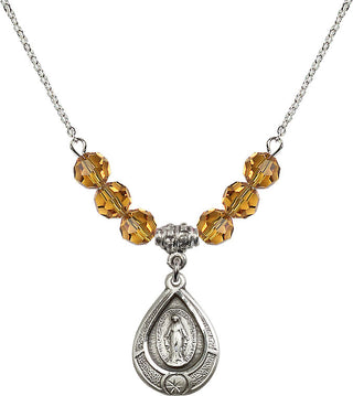 18" Rhodium Plated Necklace with 4mm Topaz Crystal Beads featuring a Sterling Silver Miraculous Medal.