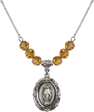 18" Rhodium Plated Necklace with 4mm Topaz Crystal Beads featuring a Sterling Silver Miraculous Medal.