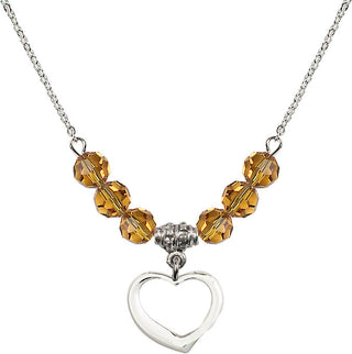 18" Rhodium Plated Necklace with 4mm Topaz Crystal Beads featuring a Sterling Silver Heart Medal.