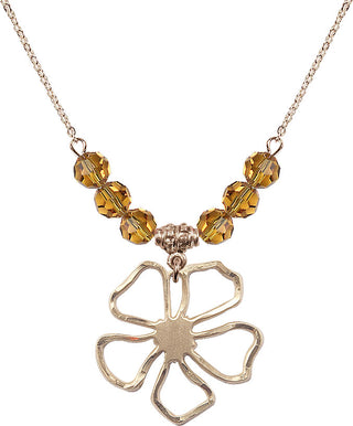 18" Hamilton Gold Plated Necklace with 4mm Topaz Crystal Beads featuring a 14kt Gold Filled Five Pedal Flower Medal.