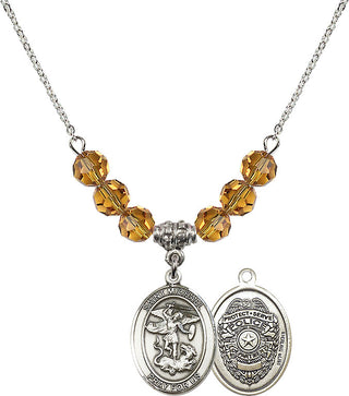18" Rhodium Plated Necklace with 4mm Topaz Crystal Beads featuring a Sterling Silver Saint Michael the Archangel Medal.