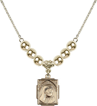 18" Hamilton Gold Plated Necklace with 6mm 14kt Gold Filled Beads featuring a 14kt Gold Filled Saint Teresa of Calcutta Medal. Engraved Catholic Saint Jewelry