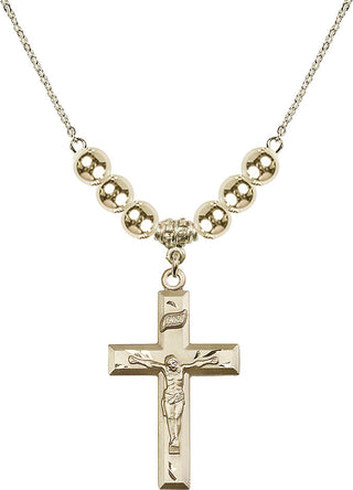 18" Hamilton Gold Plated Necklace with 6mm 14kt Gold Filled Beads featuring a 14kt Gold Filled Crucifix Medal.