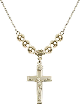 18" Hamilton Gold Plated Necklace with 6mm 14kt Gold Filled Beads featuring a 14kt Gold Filled Crucifix Medal.