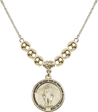 18" Hamilton Gold Plated Necklace with 6mm 14kt Gold Filled Beads featuring a 14kt Gold Filled Miraculous Medal.