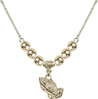 18" Hamilton Gold Plated Necklace with 6mm 14kt Gold Filled Beads featuring a 14kt Gold Filled Praying Hands Medal.
