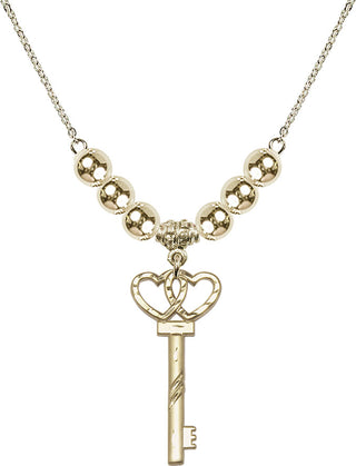 18" Hamilton Gold Plated Necklace with 6mm 14kt Gold Filled Beads featuring a 14kt Gold Filled Small Key w/Double Hearts Medal.