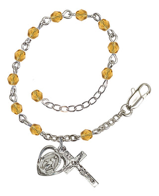 Adjustable Silver Plated 4mm Fire Polished Rosary Bracelet in Topaz