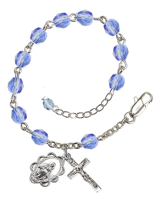 Adjustable Silver Plated 6mm Fire Polished Rosary Bracelet in Light Sapphire