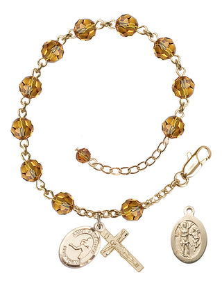 Adjustable 14 Karat Gold-Filled 6mm Austrian Crystal Saint Sebastian/Track & Field Rosary Bracelet in Topaz