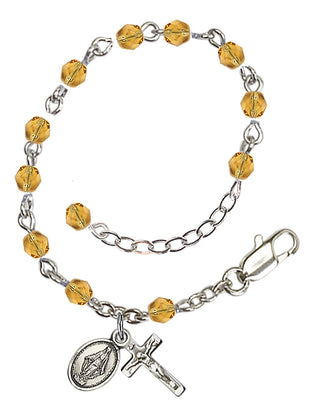 Adjustable Silver Plated 4mm Fire Polished Rosary Bracelet in Topaz